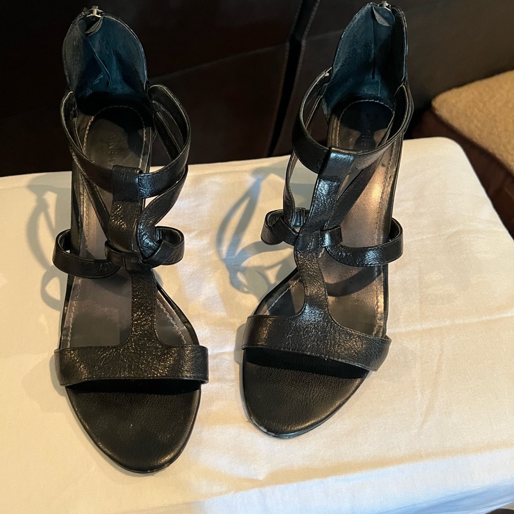 Black sandal shoes.